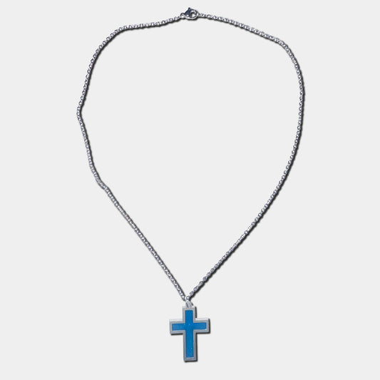 Stainless steel necklace with blue cross pendant on a white background