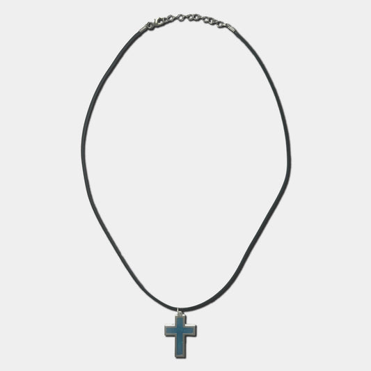 Black cord necklace with blue cross pendant on a white background
