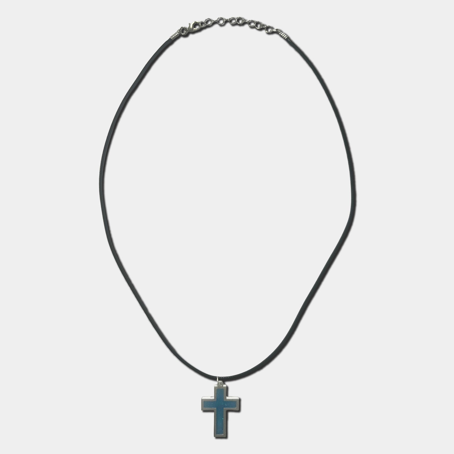 Black cord necklace with blue cross pendant on a white background