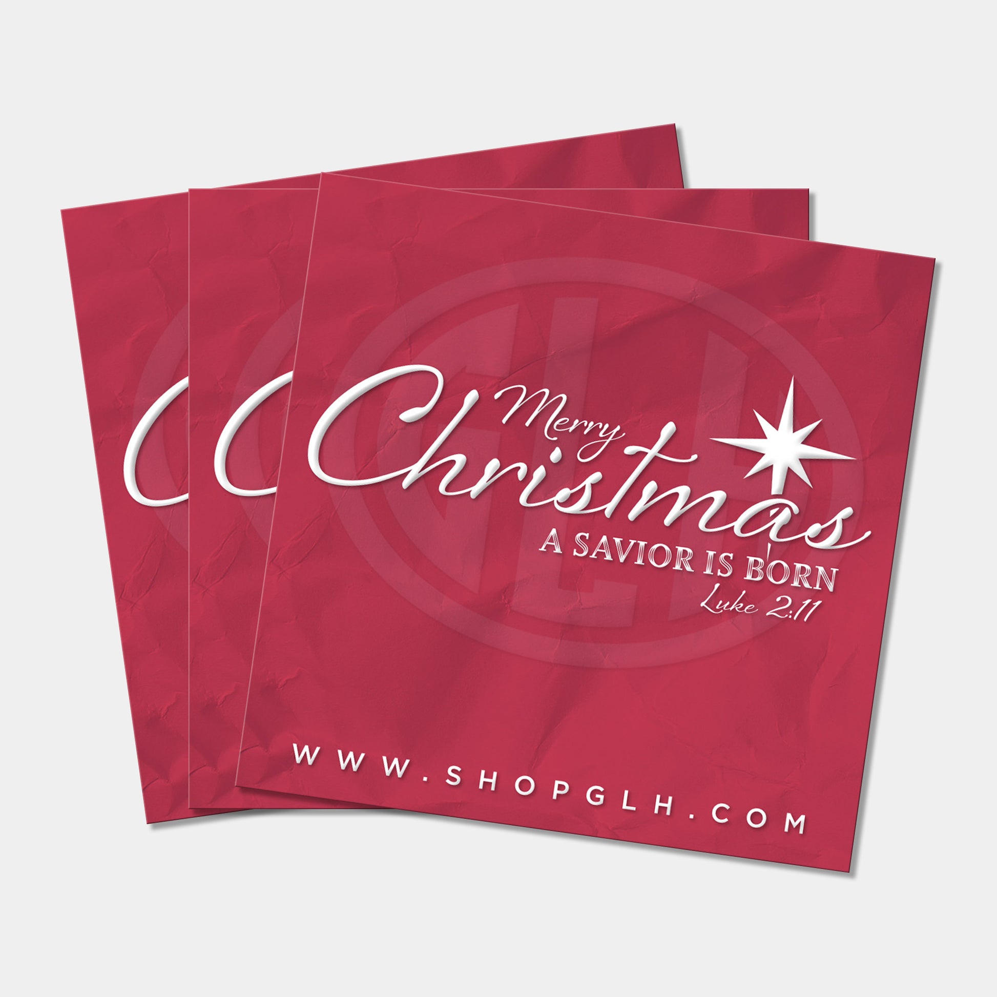 Three red square stickers with 'Merry Christmas, A Savior is Born' text and star design on a white background.